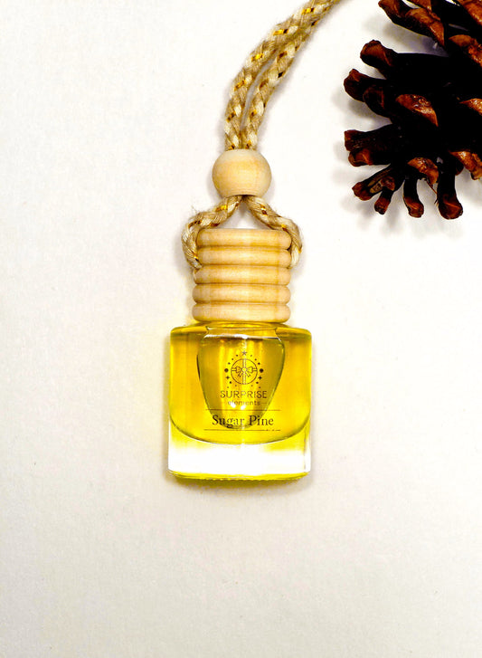 Small yellow bottle with wooden cap on a white background