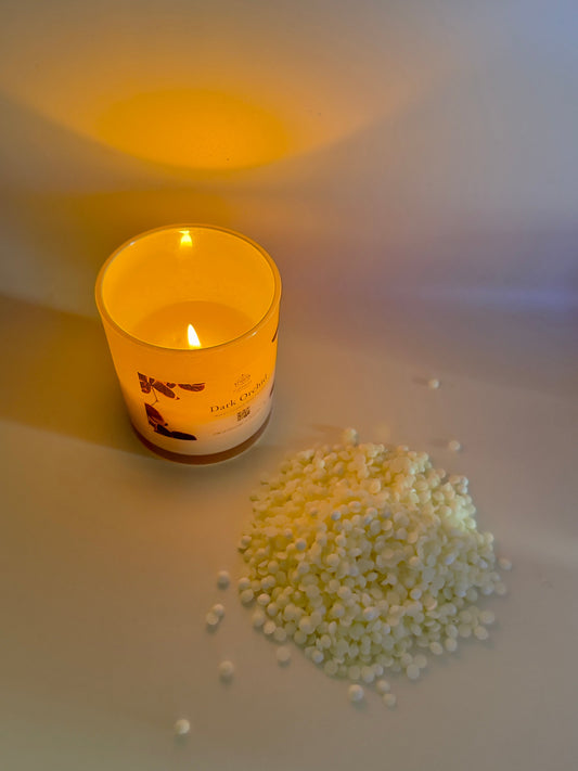 Clean burning coconut wax candle with pure white wax pellets showing no soot or residue