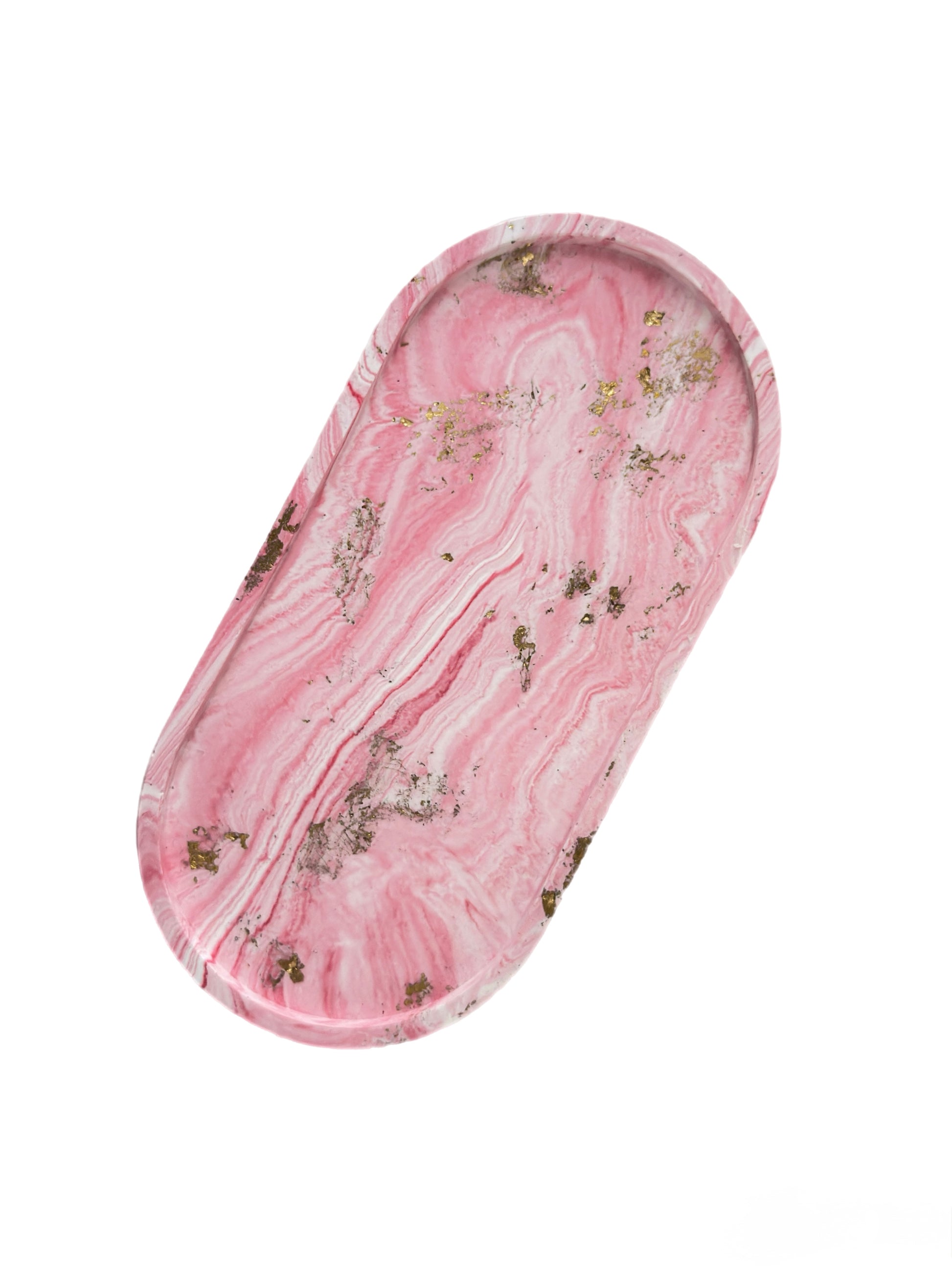 Pink marbled tray with gold flaks on a white background