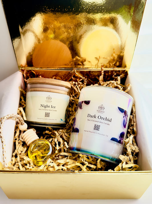 Gift set with candles and a bottle of car fragrance in a decorative box. 
Night ice 4oz coconut wax candle.
Dark Orchid 9oz coconut wax candle 
obsidian car fragrance hand-poured in Houston Texas surprise elements logo on it.