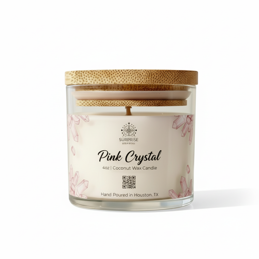 Pink Crystal 4oz coconut wax candle hand-poured in Houston Texas with surprise elements logo on it