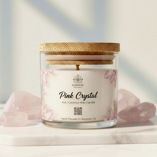 Pink Crystal 4oz with Minimal Background 
4oz coconut wax candle hand-poured in Houston Texas surprise elements logo on it