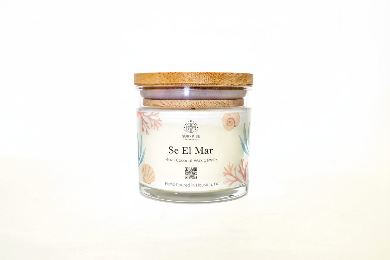 Se El Mar 4oz coconut wax candle hand-poured in Houston Texas label  surprise elements logo on it 