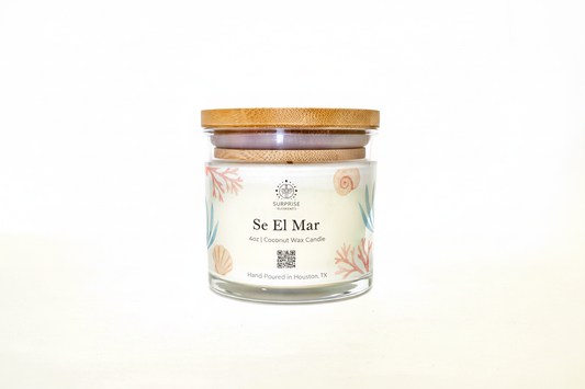 Se El Mar 4oz coconut wax candle hand-poured in Houston Texas label  surprise elements logo on it 