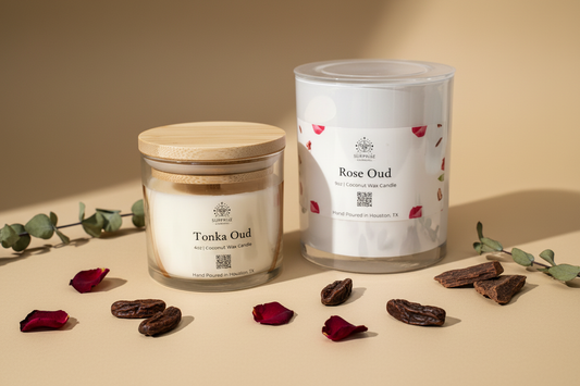 Bundle of 2 Tonka Oud and Rose Oud with styling elements pearl white jar 9oz coconut wax candle hand-poured in Houston Texas and clear candle jar with bamboo lid 4oz coconut wax candle hand-poured in Houston Texas written on the label