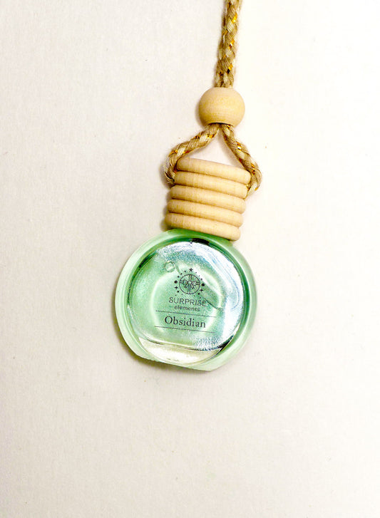 Green bottle with wooden cap on a beige background